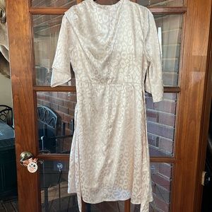 Boutique leopard print champagne wrap dress